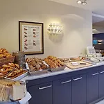 Hilton Garden Tivoli 호텔 4*